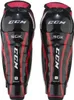 A pair of black and red CCM shin guards for children. Podgląd zdjęcia produktu