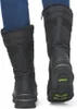 The back view of a pair of black winter boots worn by a person in blue jeans. Produktbild-Vorschau