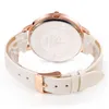 Close-up view of the back of a white leather watch with rose gold buckle and casing. Produktbild-Vorschau
