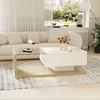 A modern living room with a couch and a coffee table. Voir les images du produit