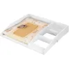 A white changing table topper with a padded mat and a small teddy bear. Produktbild-Vorschau