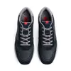 A top-down view of a pair of black sneakers on a white background. Produktbild-Vorschau