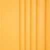 A close-up, abstract view of a textured yellow surface, likely a suitcase. Produktbild-Vorschau