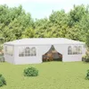 A white party tent set up in a grassy backyard with trees in the background. Produktbild-Vorschau