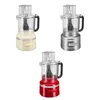 Three KitchenAid food processors in different colors arranged in a collage. Náhled obrázku produktu