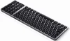 A compact, backlit Bluetooth keyboard is shown from a slightly elevated, diagonal angle against a white background. Anteprima dell’immagine prodotto