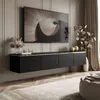 A modern living room with a wall-mounted TV and media console. Produktbild-Vorschau