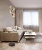 A modern living room with a sectional sofa, coffee table, and a floor lamp. Produktbild-Vorschau