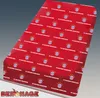 A red fabric product with a repeating pattern of the FC Bayern München logo and text, presented diagonally on a gray background. Anteprima dell’immagine prodotto