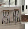 Two bar stools are shown in a kitchen or dining area setting, with close-up insets highlighting product features. Náhled obrázku produktu