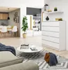 A modern living room with a dining area and a chest of drawers. Podgląd zdjęcia produktu