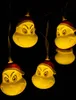 A string of Grinch-themed LED lights against a black background. Produktbild-Vorschau