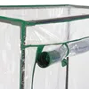 Close-up of a clear plastic greenhouse with green trim and a rolled-up section. Anteprima dell’immagine prodotto