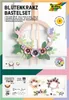 The image shows the packaging of a floral wreath craft kit, with a sample wreath displayed prominently. Produktbild-Vorschau