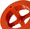 A close-up view of an orange plastic object, likely a component of a tool or device, with a central cylindrical handle and a circular outer rim. Produktbild-Vorschau