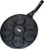 A speckled black pancake pan with seven circular indentations and a black handle, set against a white background. Náhled obrázku produktu