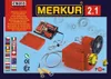 The image shows the packaging of a Merkur 2.1 construction set motor unit, including the motor, battery pack, wires, and gears. Náhled obrázku produktu