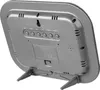 The back of a silver and black digital clock with a stand. Anteprima dell’immagine prodotto