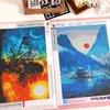 Two diamond painting kits are displayed side-by-side, showcasing completed artwork. Produktbild-Vorschau