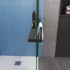 A close-up view of a modern shower enclosure with a shelf and towel holder. Produktbild-Vorschau