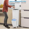 A person is shown using a multi-compartment trash can in a kitchen setting. Voir les images du produit