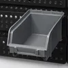 A close-up view of a gray storage bin attached to a black pegboard system. Anteprima dell’immagine prodotto