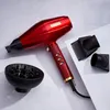 A red hairdryer with accessories is displayed on a light gray and white surface. Anteprima dell’immagine prodotto