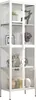 A tall, white glass display cabinet filled with decorative items. Podgląd zdjęcia produktu