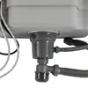 Close-up view of the underside of a sink, showing the plumbing and water supply lines. Podgląd zdjęcia produktu