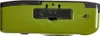 A close-up side view of a green Kodak M35 camera, showing the battery compartment and a small button. Produktbild-Vorschau