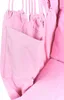 A close-up view of a pink hammock chair, showing the fabric texture and a pocket. Podgląd zdjęcia produktu