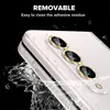 Close-up of a smartphone's camera lenses with water splashing around it. Náhled obrázku produktu