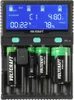 A close-up shot of a battery charger with batteries inserted, displaying information on its screen. Produktbild-Vorschau