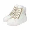 A pair of white high-top sneakers with beige laces and gold zippers, set against a white background. Produktbild-Vorschau