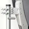 A close-up view of a satellite dish mount attached to a pole, with a label indicating stainless steel. Náhled obrázku produktu