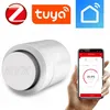 A collage of logos, a smart thermostat, and a smartphone displaying a smart home app. Produktbild-Vorschau