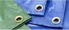 A close-up view of two tarps, one green and one blue, showing their grommets. Produktbild-Vorschau
