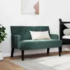 A dark green Chesterfield sofa with a white pillow on it, placed in a room with a white wall and a wooden floor. Podgląd zdjęcia produktu