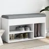A white shoe bench with a gray upholstered top, displaying various shoes on its shelves. Náhľad obrázku produktu