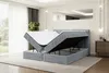 A modern bedroom with a gray velvet boxspring bed with its mattress and topper lifted to reveal storage space underneath. Produktbild-Vorschau