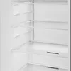 Interior view of an empty refrigerator with shelves. Voir les images du produit