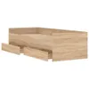A wooden bed frame with two drawers pulled out. Voir les images du produit