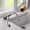 A kitchen faucet is shown in a sink next to a window. Produktbild-Vorschau