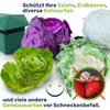 A collection of vegetables and strawberries with a green garden accessory, accompanied by text and a smiley face. Produktbild-Vorschau