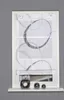 A window blind with a circular pattern is shown hanging in a window frame, with decorative spheres on the windowsill below. Produktbild-Vorschau