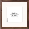 A square picture frame with a white mat and text indicating dimensions. Anteprima dell’immagine prodotto