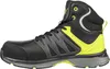 A side view of a black and yellow Puma safety boot. Voir les images du produit