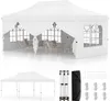 A white pop-up tent with tables and chairs inside, and a separate display of the tent components and accessories. Voir les images du produit
