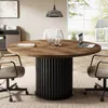 A round conference table with chairs in a modern office setting. Anteprima dell’immagine prodotto
