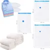 A collection of vacuum seal bags and folded textiles, including shirts and blankets, displayed on a white background with dimensions indicated. Produktbild-Vorschau